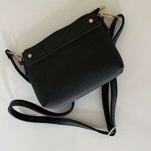 Black faux leather cross body bag